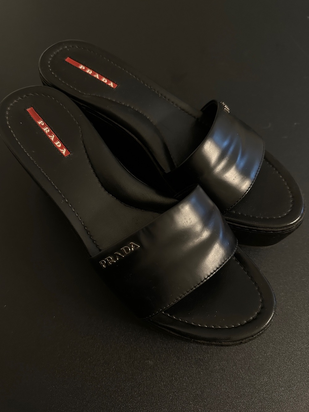 Prada Black Leather Slide Mules with Logo Plaque